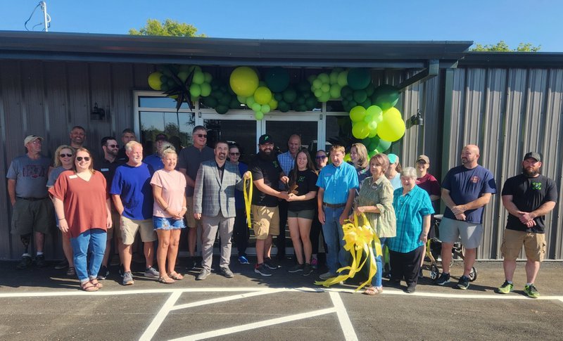 Ribbon cutting after building a gym
